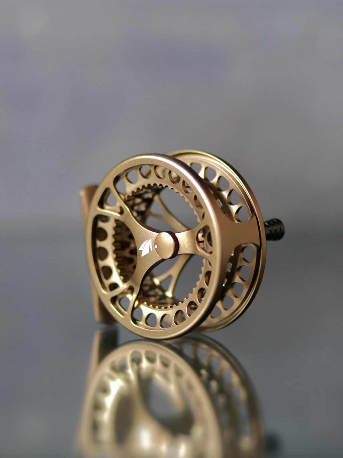 Sage Click Fliegenrolle mit Click-Pawl Bremssystem Gold