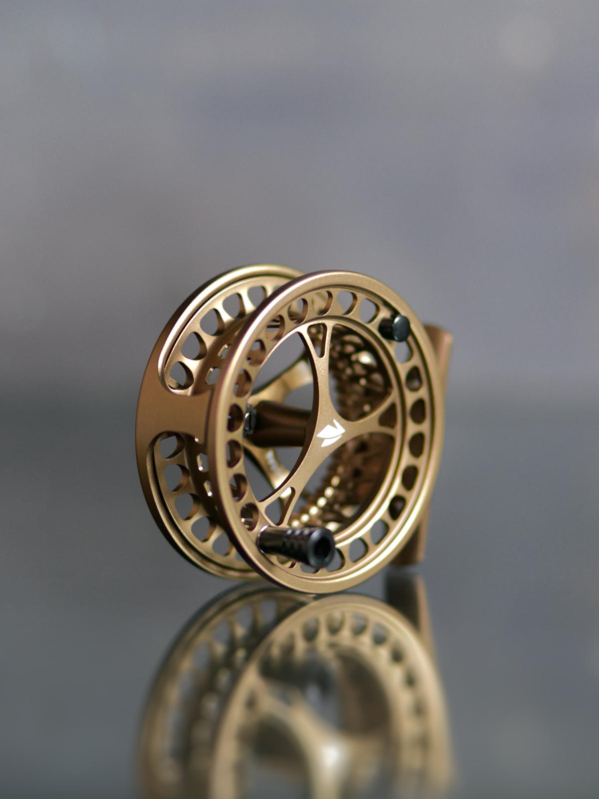 Sage Click Fliegenrolle mit Click-Pawl Bremssystem Gold